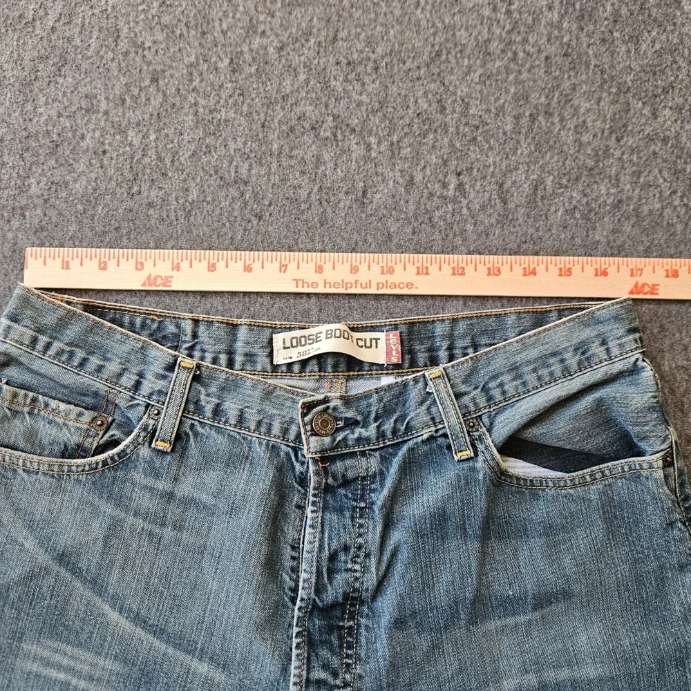 Vintage Levi's 567 Loose Boot Cut Jeans Button Fly Raw Hem Label 36x34 Act 34x31